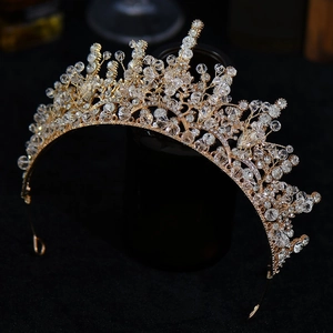 Exquisite gold crystal bridal tiara crown with intricate rhinestone branch design