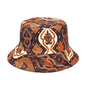 Ethnic pattern bucket hat with orange and purple print shown on a plain white background