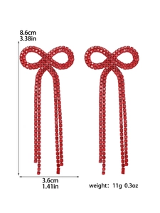 Detailed size chart for red bow tassel earrings showing dimensions 8.6cm length and 11g weight