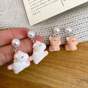 Cute flocked unicorn and pig stud earrings with white pearls for women set of two