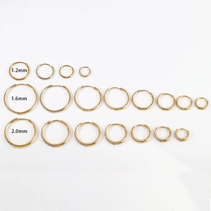 Gold stainless steel hoop earrings with zircon inlay in various sizes and thicknesses
