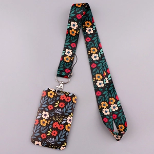 Detailed view of floral polyester lanyard and ID card holder set with metal clip