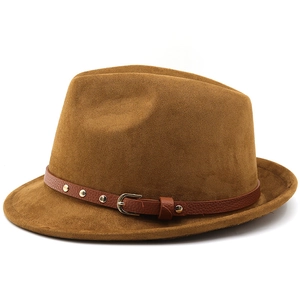 Detail of brown faux suede fedora hat with leather band and silver metal rivets