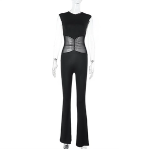 Detail of sheer mesh waist patchwork on black sleeveless jumpsuit for a slim silhouette