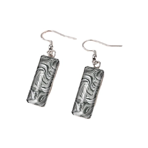 Silver rectangle earrings with black and white marble texture on white background