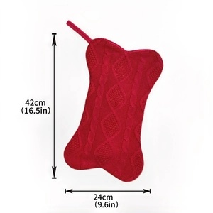 Detailed size view of red bone-shaped knitted Christmas stocking 42cm x 24cm dimensions