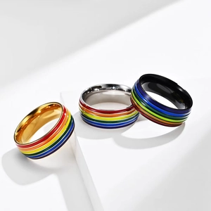Rainbow pride stripe rings in gold silver and black finishes made of titanium steel
