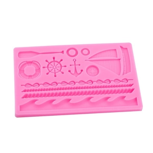 Pink silicone mold with nautical ocean patterns including anchor, rudder, and sailboat