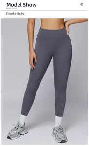 Detail view of high waist smoky grey yoga leggings with elastic compression waistband