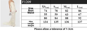 Size chart table for white strapless fishtail evening dress detailing XS to L measurements