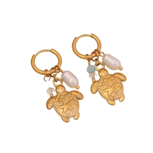 Gold sea turtle earrings with freshwater pearls and ocean-themed beaded charms