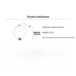Detail of adjustable copper bracelet with heart-shaped orange zircon pendant charm