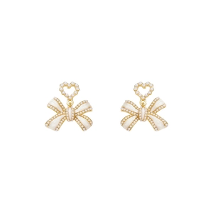 Elegant gold bow earrings with small heart pearl drops on a clean white background