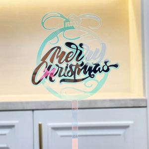 Iridescent acrylic Merry Christmas cake topper with bow design for party decor