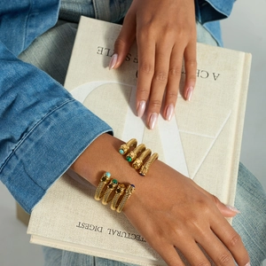 Gold cable twist cuff bracelet with natural green malachite and semi-precious stones