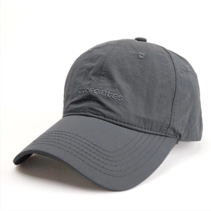 Detail of embroidered 'Appreciates' text on a dark grey breathable quick-dry baseball cap