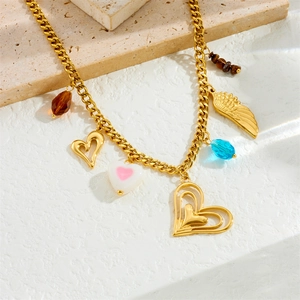 Gold-plated stainless steel necklace with wings, hearts and tiger eye stone pendants