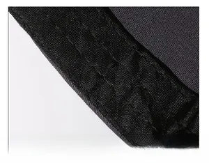 Detail view of the wide thickened sweatband and fine stitching on a baseball cap