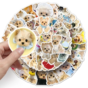 Detailed view of assorted Yorkshire Terrier dog stickers showing texture and variety