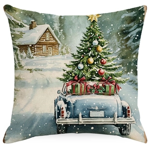 Close-up of linen pillow cover showing vintage Christmas car print and fabric texture