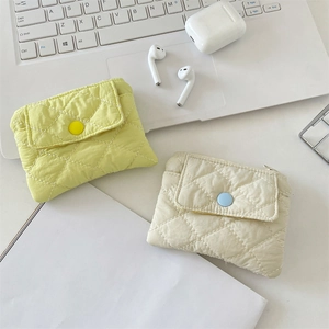 Quilted diamond pattern mini coin purse in light green and cream white colors