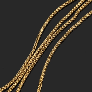 Glistening gold stainless steel spiga wheat chain necklace with intricate woven texture