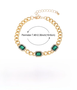 Detailed view of Cuban chain bracelet with emerald-cut crystals and lobster clasp