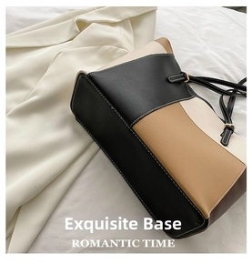 Detailansicht der Color-Block PU-Leder Tote Bag mit Lychee-Narbung und Kontrastnähten