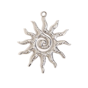 Minimalist silver sun pendant with spiral texture and hand-hammered wave sunrays