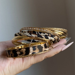 10-piece gold leopard print and crystal rhinestone stacked bangles set for women
