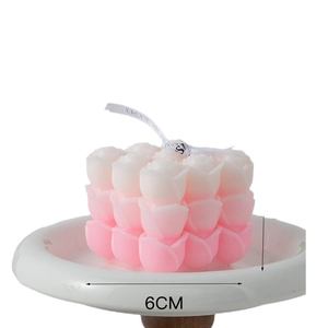 Pink and white gradient rose cluster scented candle with 6cm width on white tray