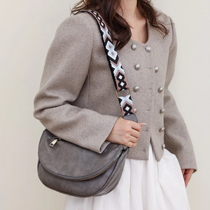 Grey half-moon crossbody bag with vintage geometric bohemian strap for women