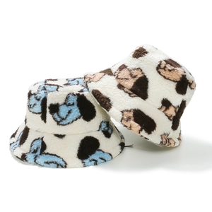 Winter plush bucket hat with cute cartoon dog print in soft faux fur material