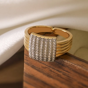 Gold-plated geometric open ring featuring square face and rows of clear zircon pavé