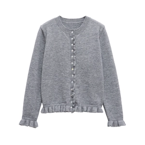 Elegant grey knitted cardigan with ruffle edges and white buttons on white background