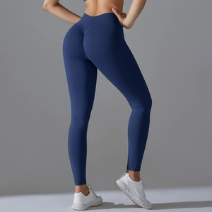 Close-up of navy blue seamless yoga leggings with V-waist and scrunch butt detail