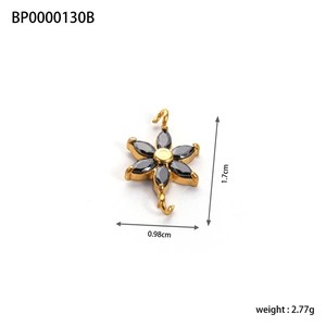 Detailed view of golden clover pendant with black zircons including size and weight specs