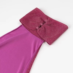 Detail of fuchsia halter dress with shimmering knit fabric and decorative buttons
