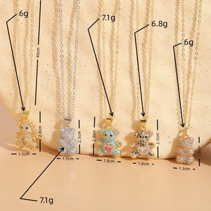 Luxury heart zircon bear pendant necklaces in gold and silver finishes for women