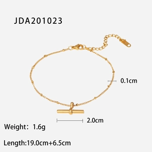 Minimalist 18K gold stainless steel cross anklet featuring a slim horizontal T-bar pendant