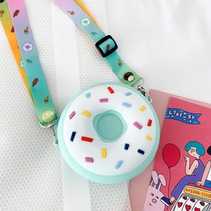 Mint green silicone donut crossbody bag with rainbow strap and sprinkles for girls