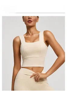 Detailed view of the square neck sports bra and high-waist leggings in cream beige