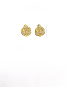 Detail of 18K gold flower earring measuring 16.4mm with delicate crystal inlays