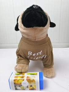 Detail of khaki dog T-shirt with Best Friends text and a blue pet cleaning brush
