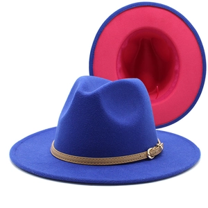 Detail of navy wool fedora with pink brim contrast, leather band and metal buckle