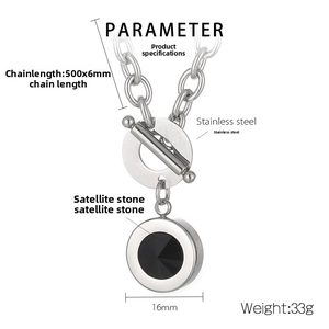 Macro detail of stainless steel toggle clasp necklace with black stone pendant and sizing