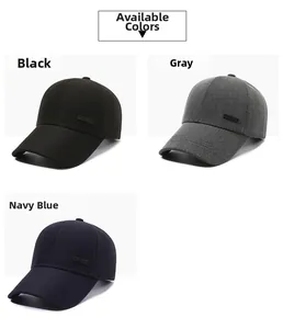 Detailed view of casual men's baseball caps in black, grey, and navy blue fabric