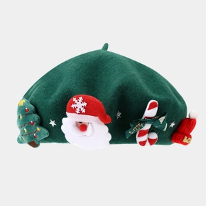 Detail of dark green wool beret featuring 3D Santa, Christmas tree and candy cane