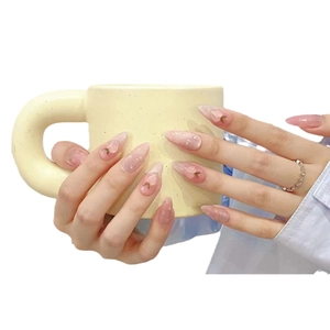 Handmade long almond press-on nails in jelly peach pink with 3D floral and moon charms