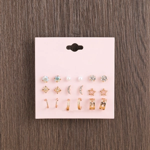 Chic 9-pair gold alloy star and moon stud earring set with pearls and crystals on pink card